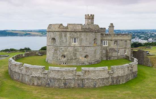 A view of Pendennis Castle with the sea in the background.